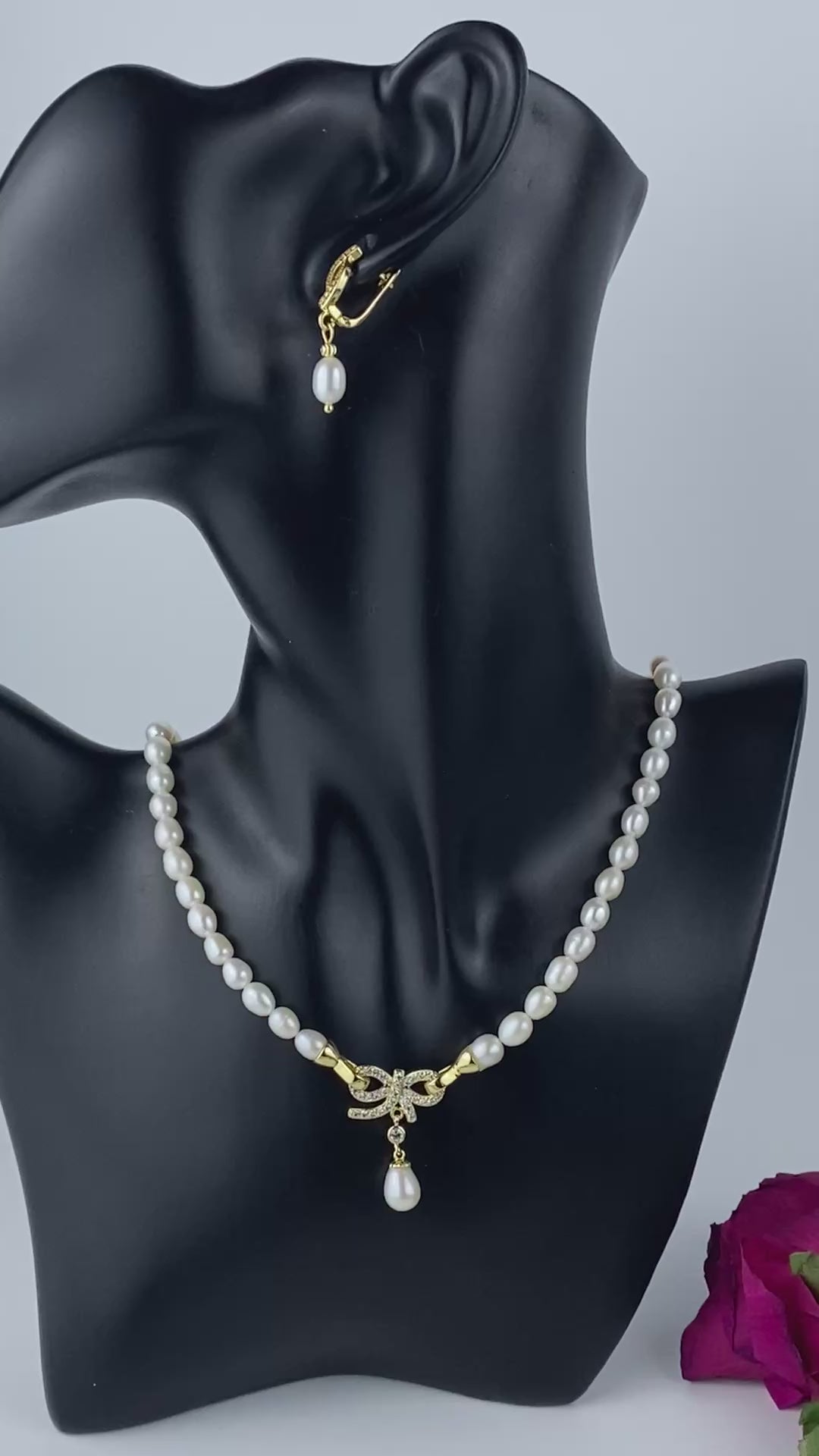 Chic Bridal Natural Smooth Rice Pearl Necklace with 18k Gold Plated Crystal Bow Pendant, Matching 18k Gold Plated earrings.Complete Bridal Set.